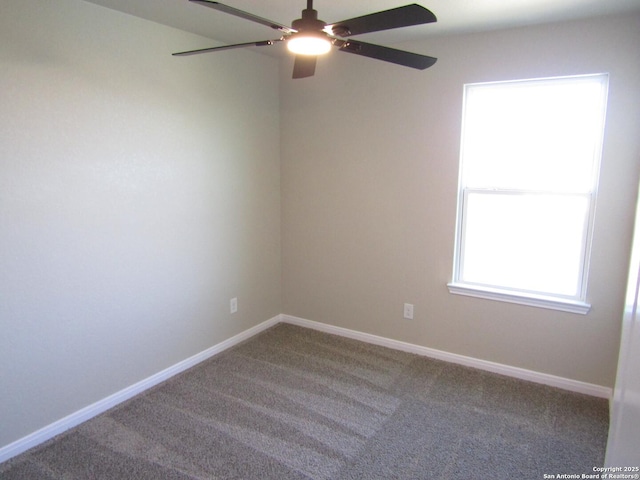 carpeted empty room with ceiling fan