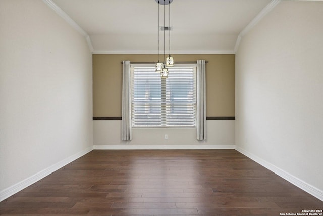 empty room featuring crown molding and dark wood-type flooring