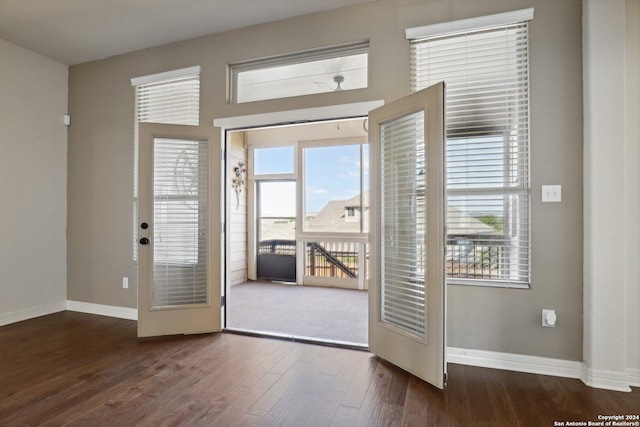 doorway featuring dark hardwood / wood-style floors