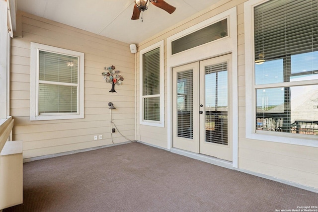 exterior space featuring french doors and ceiling fan