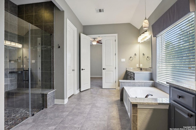 bathroom featuring ceiling fan, lofted ceiling, vanity, and separate shower and tub