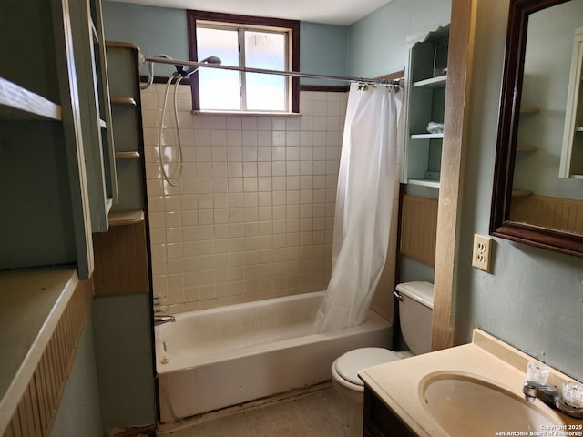 full bathroom featuring shower / tub combo, vanity, and toilet