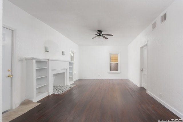 unfurnished living room with ceiling fan and dark hardwood / wood-style flooring