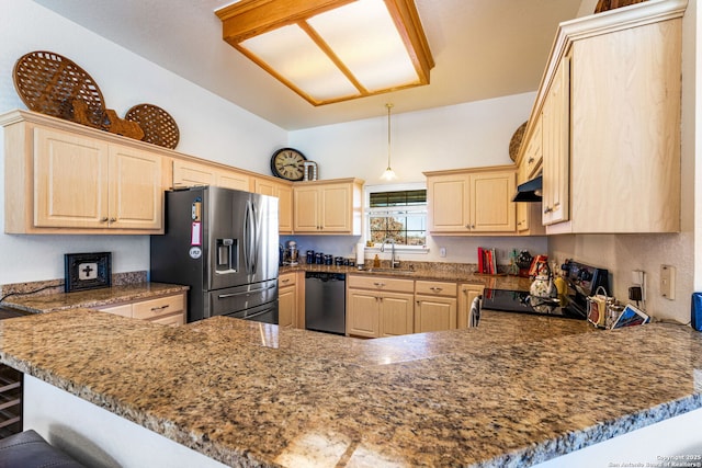 kitchen featuring stainless steel appliances, light brown cabinets, and kitchen peninsula