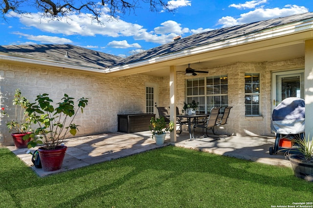 view of patio with ceiling fan