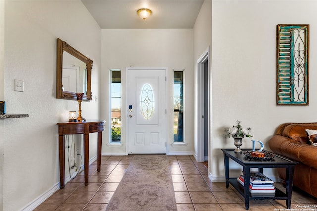 view of tiled foyer entrance