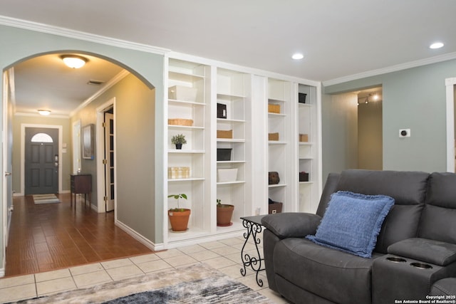 tiled living room featuring crown molding