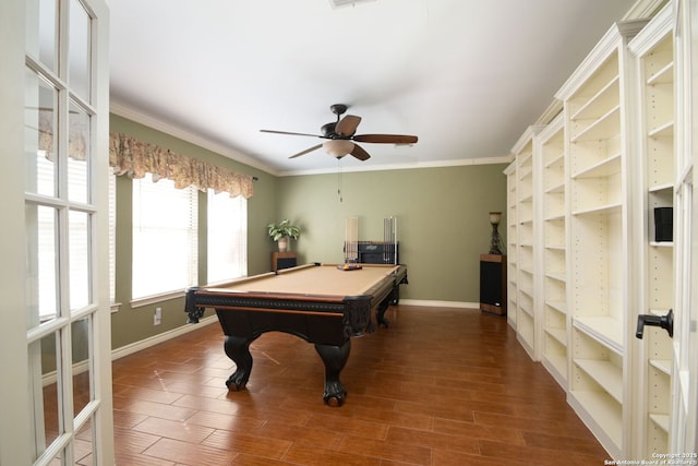 recreation room with crown molding, dark wood-type flooring, ceiling fan, and billiards