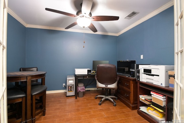 office area featuring crown molding, ceiling fan, and light wood-type flooring