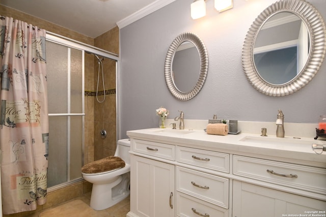 bathroom featuring vanity, toilet, a shower with shower door, and tile patterned flooring