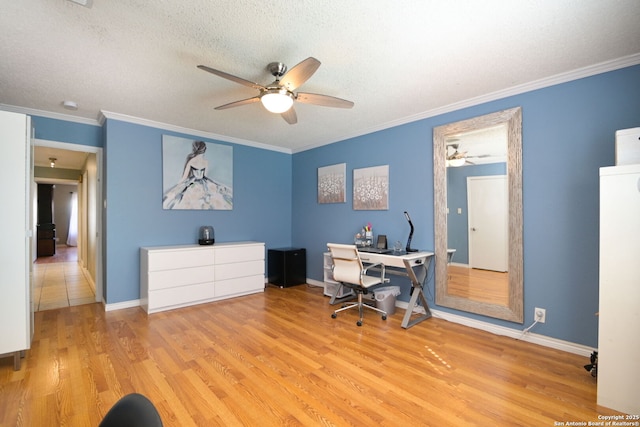 office area with crown molding, ceiling fan, a textured ceiling, and light wood-type flooring