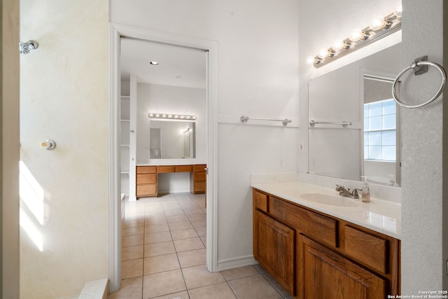 bathroom with vanity and tile patterned floors