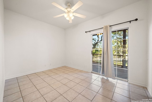 tiled empty room with ceiling fan