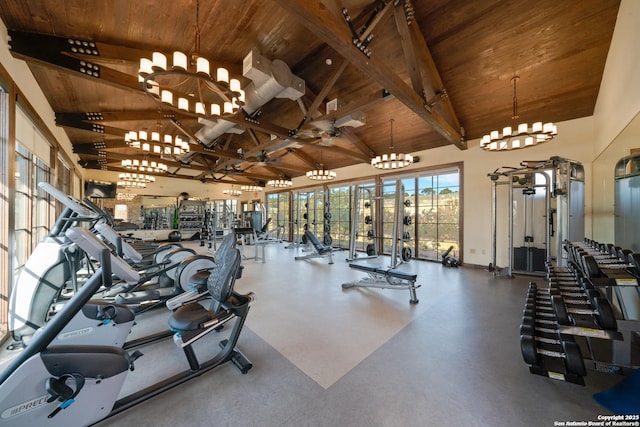 workout area with high vaulted ceiling, a notable chandelier, and wood ceiling