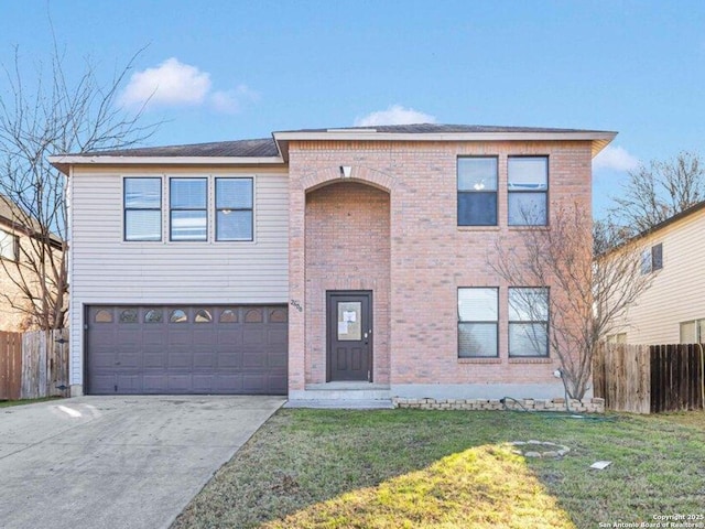 view of front of home with a garage and a front lawn