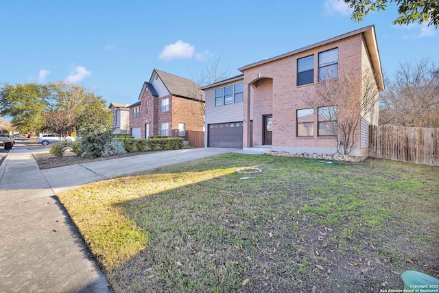 view of front of house with a garage and a front lawn