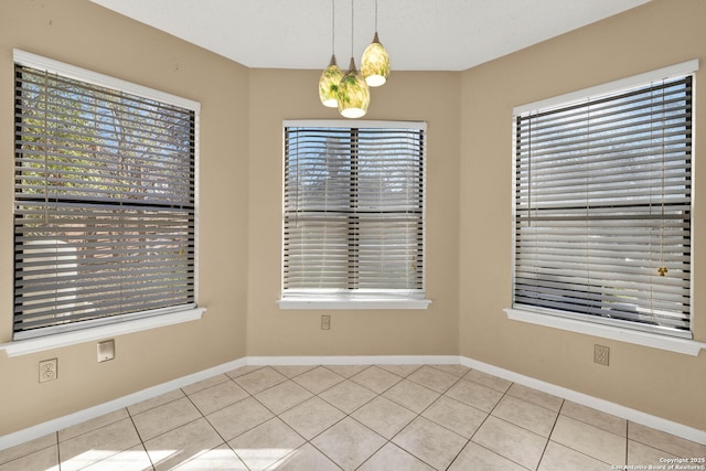 view of tiled spare room