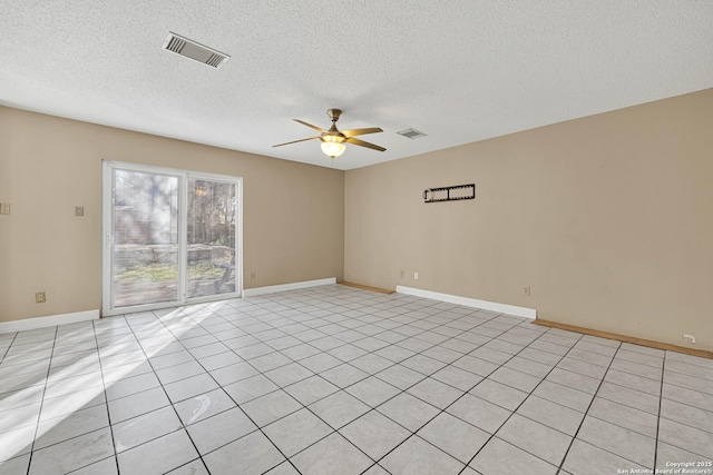 unfurnished room with a textured ceiling and ceiling fan