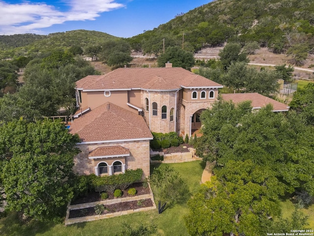 bird's eye view with a mountain view