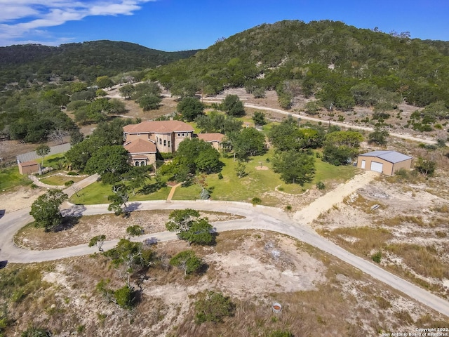 drone / aerial view featuring a mountain view