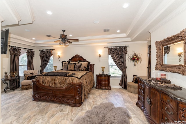 bedroom with crown molding, a raised ceiling, and ceiling fan