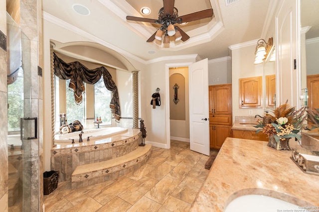 bathroom featuring crown molding, ceiling fan, vanity, tiled bath, and a raised ceiling