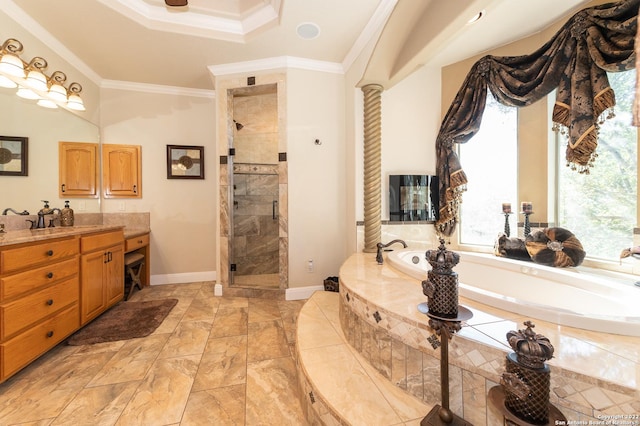 bathroom with ornate columns, crown molding, separate shower and tub, and vanity