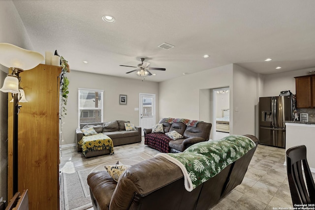 living room featuring ceiling fan