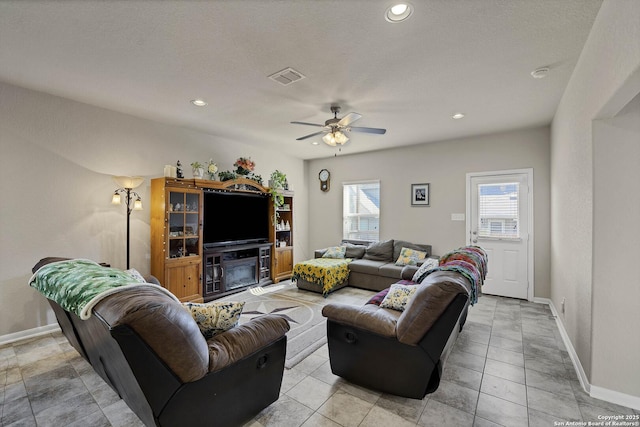 living room featuring ceiling fan