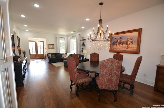 dining area with french doors and wood-type flooring