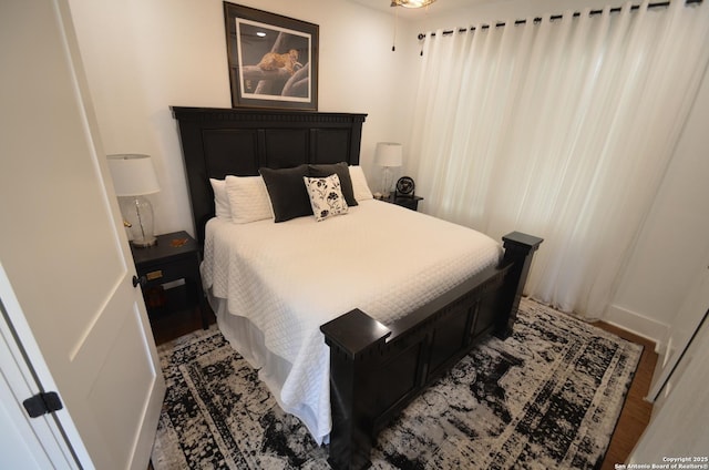 bedroom featuring hardwood / wood-style flooring