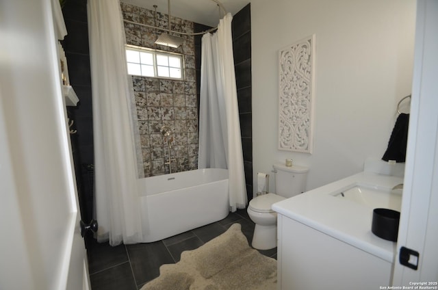 full bathroom with tile patterned flooring, vanity, shower / tub combo, and toilet