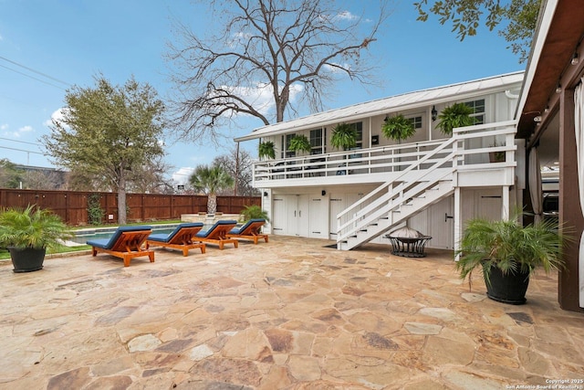 view of patio / terrace featuring a fenced in pool