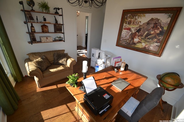 interior space featuring dark hardwood / wood-style floors and a chandelier