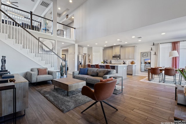 living room with light hardwood / wood-style flooring