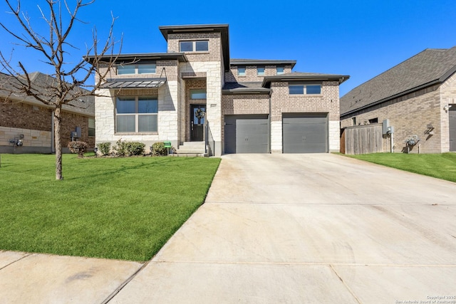 view of front facade featuring a garage and a front lawn