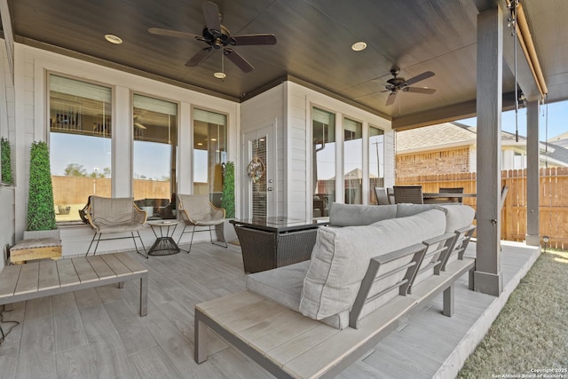 view of patio / terrace with ceiling fan and outdoor lounge area