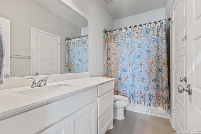 full bathroom featuring vanity, shower / tub combo, tile patterned floors, and toilet