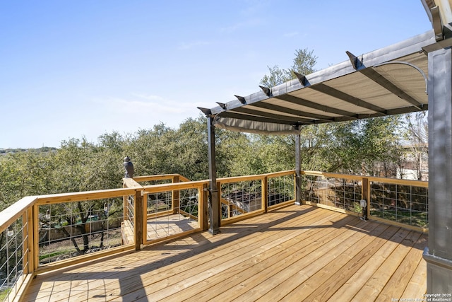 wooden terrace with a pergola