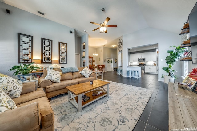 tiled living room featuring high vaulted ceiling and ceiling fan