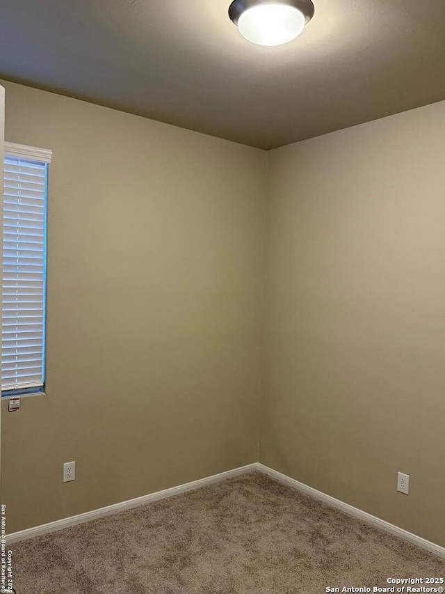 empty room with carpet floors