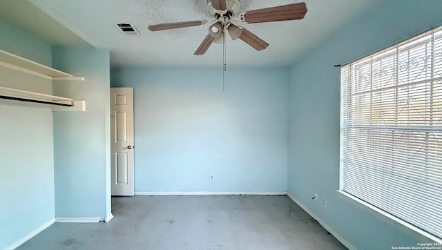 empty room with ceiling fan