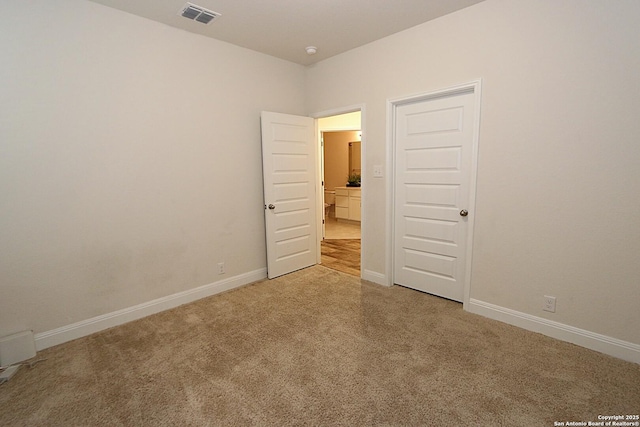 unfurnished bedroom featuring carpet flooring