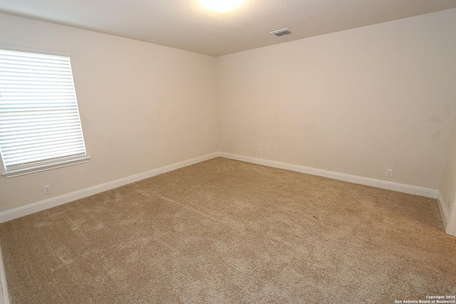 view of carpeted spare room