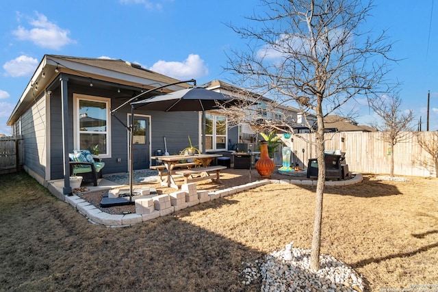 rear view of property with a patio