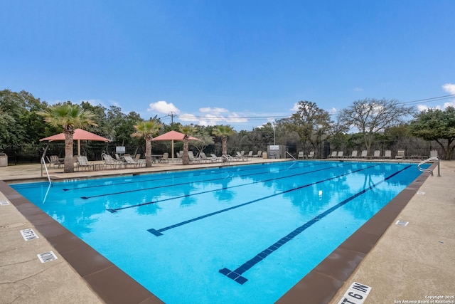 view of swimming pool featuring a gazebo