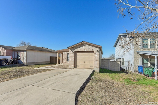 ranch-style home featuring a garage and a front lawn