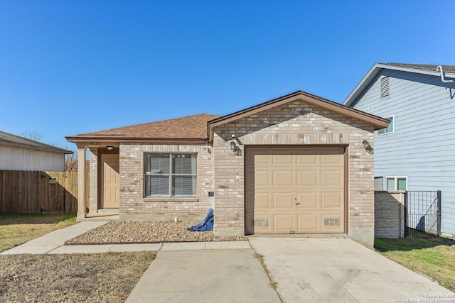 single story home featuring a garage