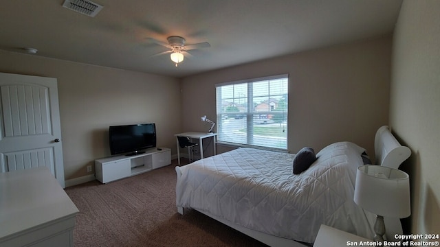 bedroom with ceiling fan and carpet flooring