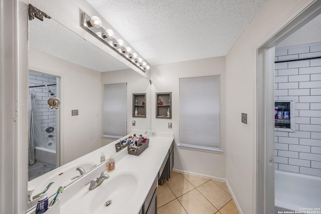 bathroom featuring vanity, a textured ceiling, and shower / bath combo with shower curtain